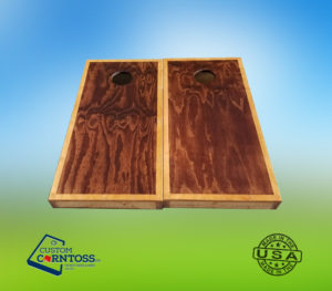 A front view of a set of Custom Corntoss stained wood trimmed cornhole boards