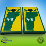 Cornhole boards with yellow and green Vermont flag pattern