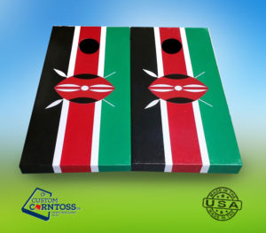 Cornhole boards with red, green, and black flag pattern